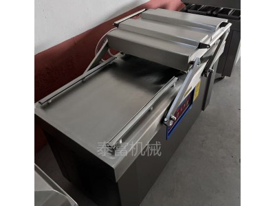 鹵貨鴨脖鴨頭真空包裝機 帶湯下沉式真空包裝機圖1